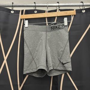 Gray Nike pro. 5 inch.